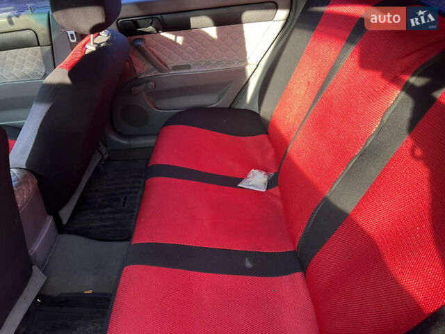 Черный Шевроле Лачетти, объемом двигателя 1.6 л и пробегом 220 тыс. км за 3300 $, фото 2 на Automoto.ua