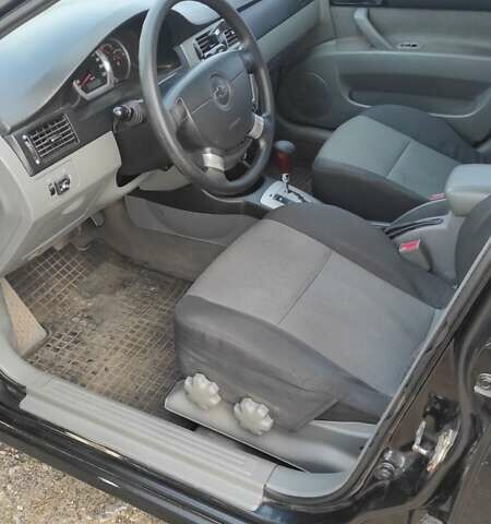 Черный Шевроле Лачетти, объемом двигателя 1.8 л и пробегом 390 тыс. км за 3100 $, фото 14 на Automoto.ua