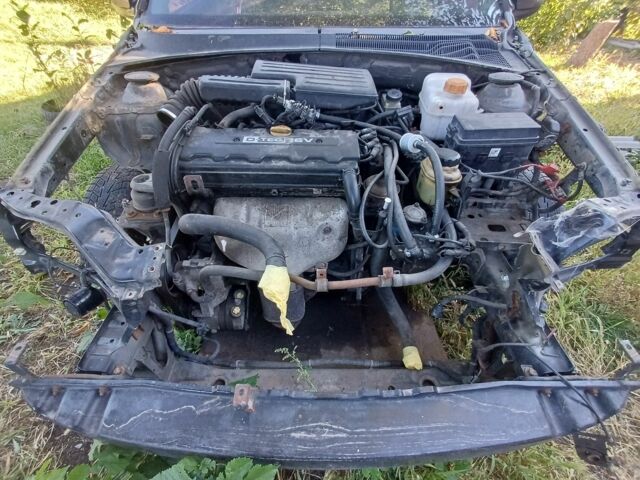 Чорний Шевроле Лачетті, об'ємом двигуна 1.8 л та пробігом 200 тис. км за 953 $, фото 9 на Automoto.ua