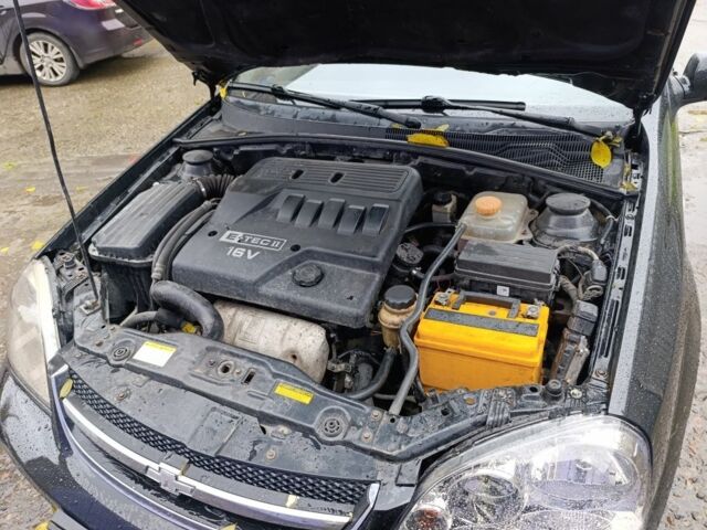 Черный Шевроле Лачетти, объемом двигателя 1.6 л и пробегом 245 тыс. км за 3650 $, фото 6 на Automoto.ua