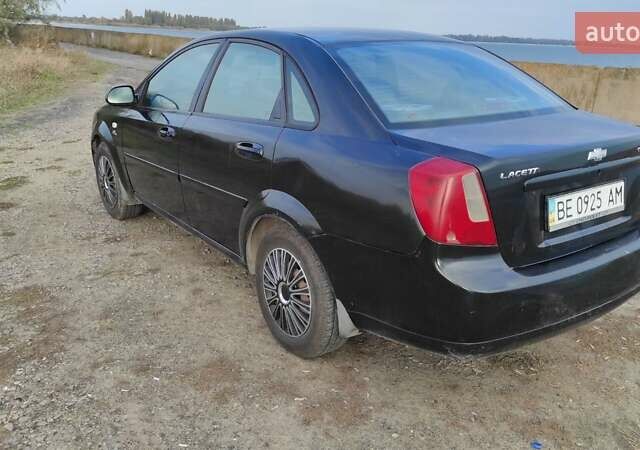 Черный Шевроле Лачетти, объемом двигателя 1.8 л и пробегом 390 тыс. км за 3100 $, фото 17 на Automoto.ua