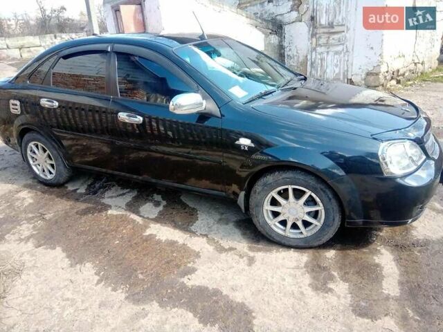 Черный Шевроле Лачетти, объемом двигателя 1.8 л и пробегом 145 тыс. км за 4100 $, фото 2 на Automoto.ua
