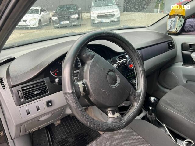 Чорний Шевроле Лачетті, об'ємом двигуна 1.6 л та пробігом 247 тис. км за 3890 $, фото 16 на Automoto.ua