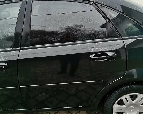 Чорний Шевроле Лачетті, об'ємом двигуна 1.6 л та пробігом 185 тис. км за 5300 $, фото 23 на Automoto.ua