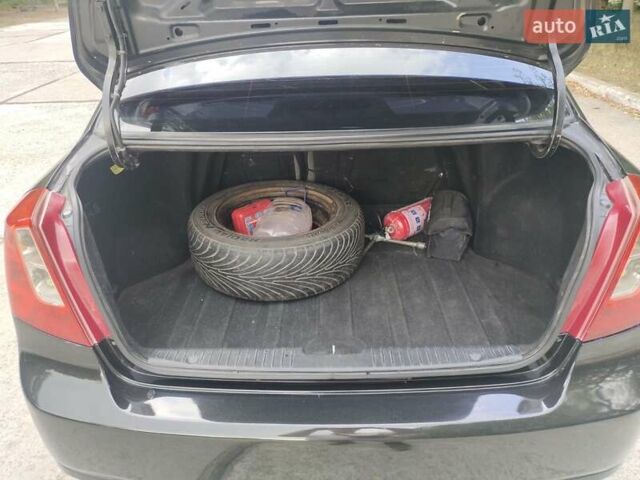 Черный Шевроле Лачетти, объемом двигателя 1.8 л и пробегом 265 тыс. км за 4600 $, фото 43 на Automoto.ua