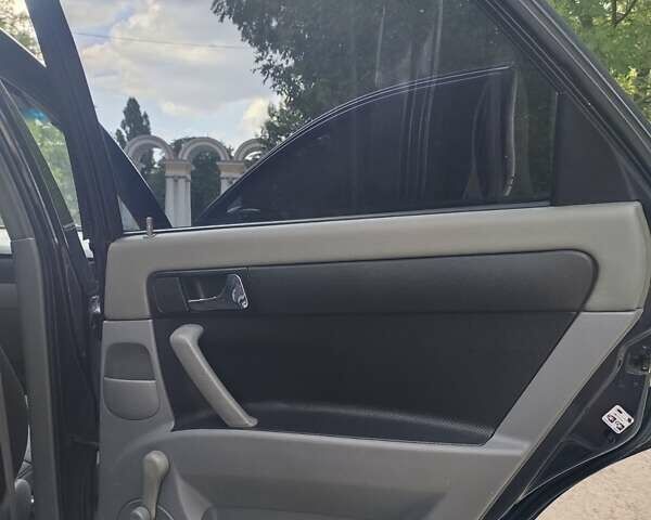 Черный Шевроле Лачетти, объемом двигателя 1.8 л и пробегом 265 тыс. км за 4600 $, фото 20 на Automoto.ua