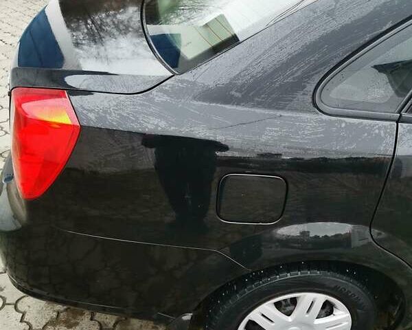 Чорний Шевроле Лачетті, об'ємом двигуна 1.6 л та пробігом 185 тис. км за 5300 $, фото 32 на Automoto.ua