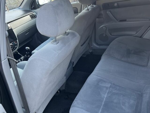 Черный Шевроле Лачетти, объемом двигателя 1.6 л и пробегом 150 тыс. км за 5300 $, фото 10 на Automoto.ua