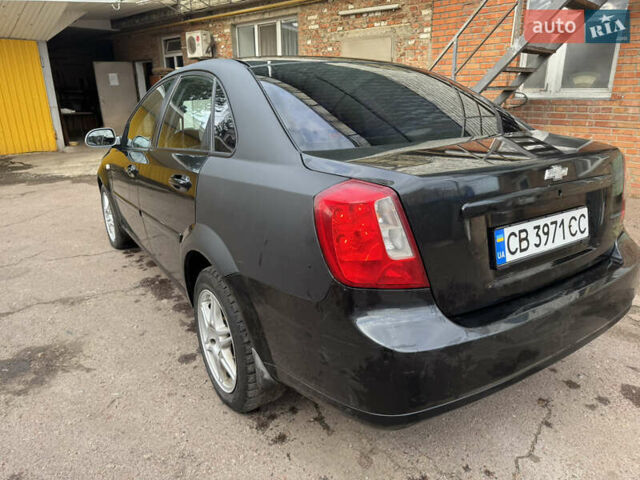 Черный Шевроле Лачетти, объемом двигателя 1.8 л и пробегом 220 тыс. км за 2999 $, фото 7 на Automoto.ua