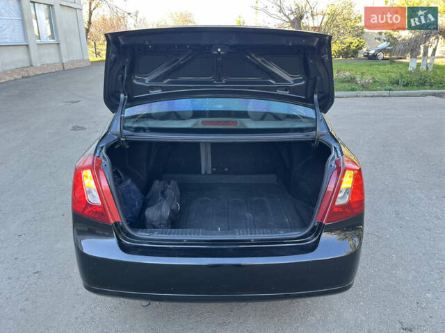 Черный Шевроле Лачетти, объемом двигателя 1.8 л и пробегом 198 тыс. км за 3600 $, фото 21 на Automoto.ua