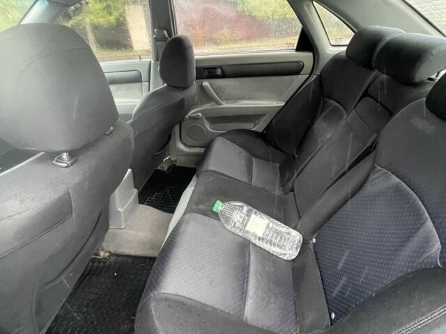 Черный Шевроле Лачетти, объемом двигателя 1.6 л и пробегом 307 тыс. км за 2800 $, фото 5 на Automoto.ua