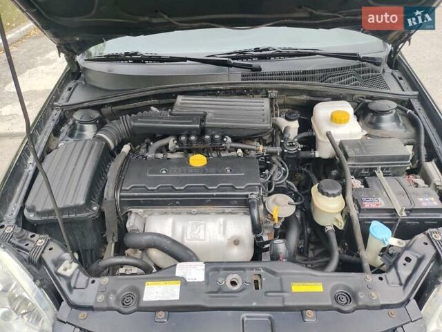 Черный Шевроле Лачетти, объемом двигателя 1.8 л и пробегом 265 тыс. км за 4600 $, фото 45 на Automoto.ua