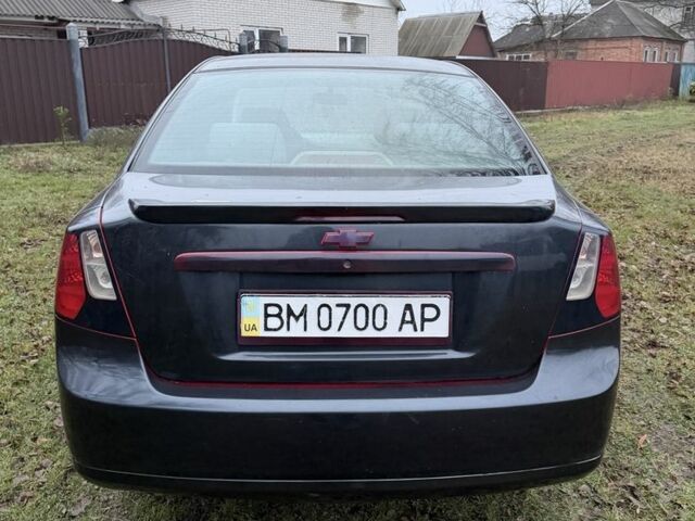 Черный Шевроле Лачетти, объемом двигателя 1.8 л и пробегом 213 тыс. км за 3750 $, фото 10 на Automoto.ua