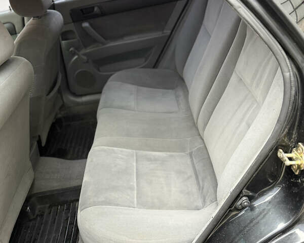 Черный Шевроле Лачетти, объемом двигателя 1.6 л и пробегом 260 тыс. км за 2900 $, фото 9 на Automoto.ua