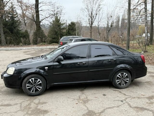 Черный Шевроле Лачетти, объемом двигателя 1.6 л и пробегом 260 тыс. км за 2750 $, фото 4 на Automoto.ua