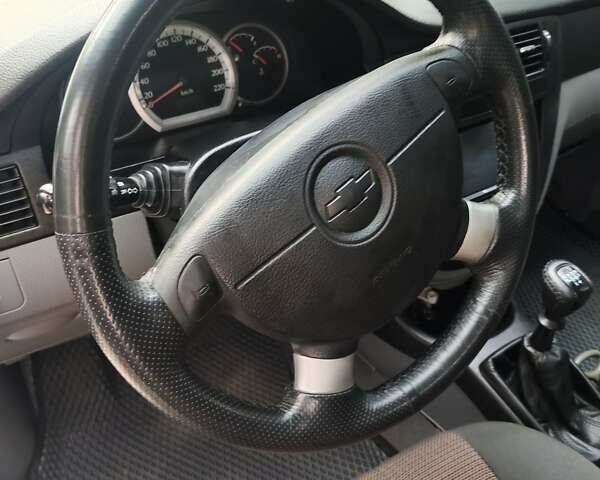 Черный Шевроле Лачетти, объемом двигателя 1.8 л и пробегом 265 тыс. км за 4600 $, фото 30 на Automoto.ua