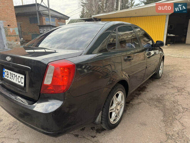 Черный Шевроле Лачетти, объемом двигателя 1.8 л и пробегом 220 тыс. км за 2999 $, фото 6 на Automoto.ua