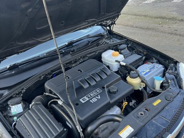 Черный Шевроле Лачетти, объемом двигателя 1.6 л и пробегом 150 тыс. км за 5300 $, фото 16 на Automoto.ua