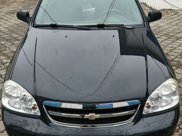 Черный Шевроле Лачетти, объемом двигателя 1.6 л и пробегом 185 тыс. км за 5300 $, фото 7 на Automoto.ua