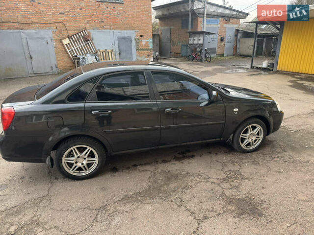 Черный Шевроле Лачетти, объемом двигателя 1.8 л и пробегом 220 тыс. км за 2999 $, фото 4 на Automoto.ua