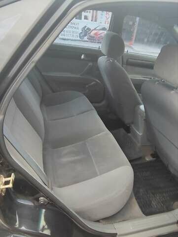 Черный Шевроле Лачетти, объемом двигателя 1.8 л и пробегом 190 тыс. км за 2900 $, фото 4 на Automoto.ua