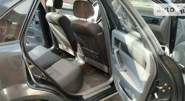 Черный Шевроле Лачетти, объемом двигателя 1.8 л и пробегом 237 тыс. км за 3850 $, фото 11 на Automoto.ua