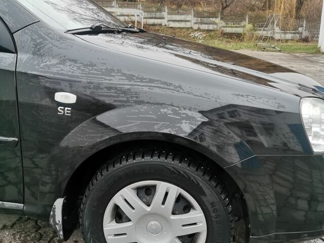 Черный Шевроле Лачетти, объемом двигателя 1.6 л и пробегом 185 тыс. км за 5300 $, фото 12 на Automoto.ua