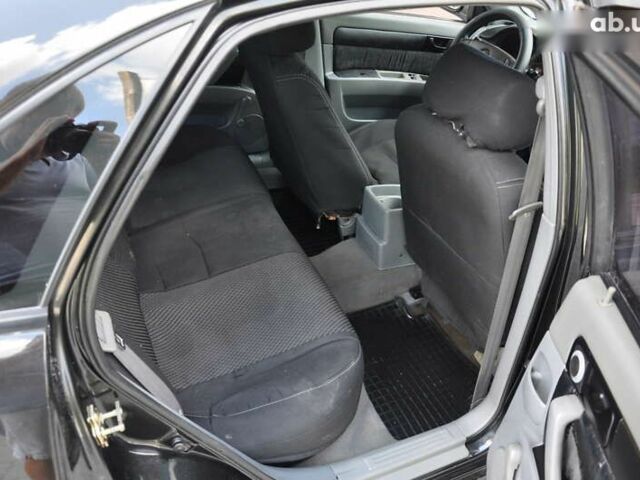 Черный Шевроле Лачетти, объемом двигателя 1.6 л и пробегом 245 тыс. км за 2999 $, фото 15 на Automoto.ua