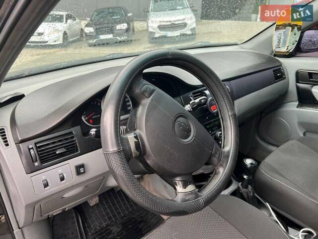 Черный Шевроле Лачетти, объемом двигателя 1.6 л и пробегом 247 тыс. км за 3890 $, фото 16 на Automoto.ua