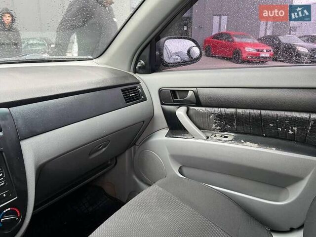 Черный Шевроле Лачетти, объемом двигателя 1.6 л и пробегом 247 тыс. км за 3890 $, фото 28 на Automoto.ua