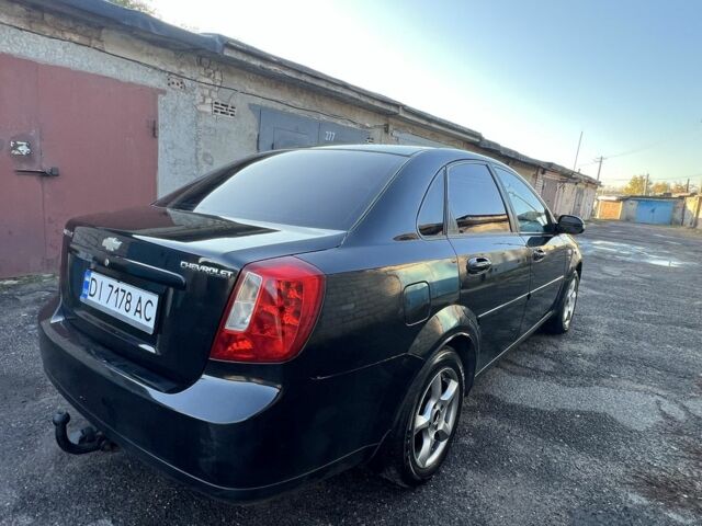 Черный Шевроле Лачетти, объемом двигателя 1.8 л и пробегом 300 тыс. км за 3950 $, фото 3 на Automoto.ua