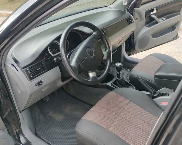 Черный Шевроле Лачетти, объемом двигателя 1.8 л и пробегом 265 тыс. км за 4600 $, фото 23 на Automoto.ua