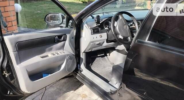 Черный Шевроле Лачетти, объемом двигателя 1.8 л и пробегом 237 тыс. км за 3850 $, фото 8 на Automoto.ua