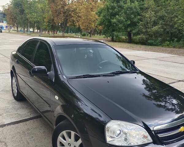 Черный Шевроле Лачетти, объемом двигателя 1.8 л и пробегом 265 тыс. км за 4600 $, фото 1 на Automoto.ua