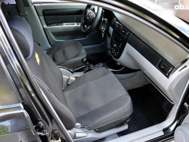 Черный Шевроле Лачетти, объемом двигателя 1.6 л и пробегом 245 тыс. км за 2999 $, фото 14 на Automoto.ua