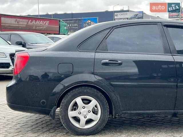 Черный Шевроле Лачетти, объемом двигателя 1.6 л и пробегом 247 тыс. км за 3890 $, фото 9 на Automoto.ua
