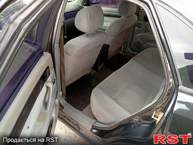 Черный Шевроле Лачетти, объемом двигателя 1.6 л и пробегом 350 тыс. км за 3000 $, фото 9 на Automoto.ua