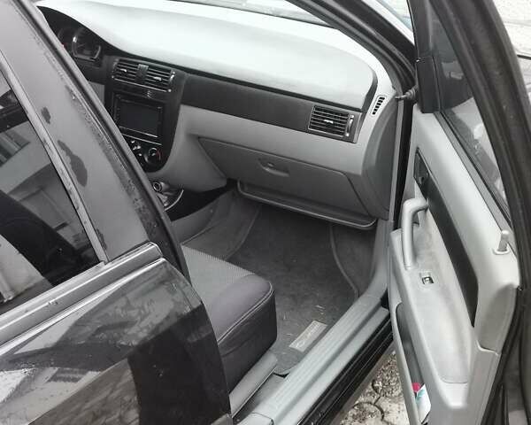 Чорний Шевроле Лачетті, об'ємом двигуна 1.6 л та пробігом 185 тис. км за 5300 $, фото 26 на Automoto.ua