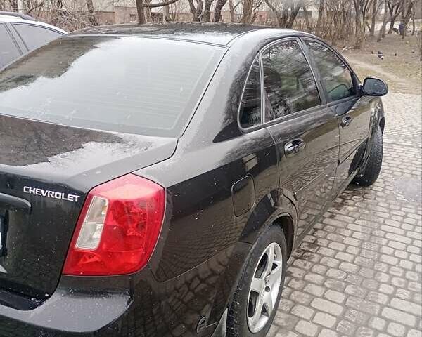 Черный Шевроле Лачетти, объемом двигателя 1.6 л и пробегом 285 тыс. км за 2900 $, фото 9 на Automoto.ua