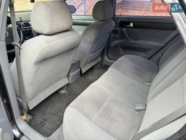 Черный Шевроле Лачетти, объемом двигателя 1.8 л и пробегом 220 тыс. км за 2999 $, фото 14 на Automoto.ua