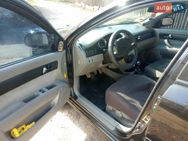 Черный Шевроле Лачетти, объемом двигателя 1.8 л и пробегом 145 тыс. км за 4100 $, фото 3 на Automoto.ua