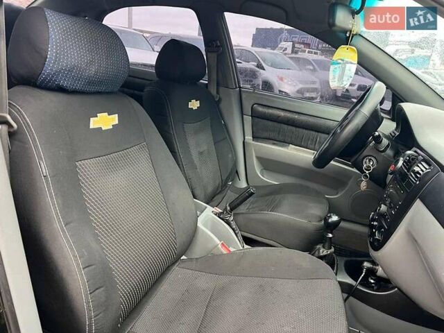 Черный Шевроле Лачетти, объемом двигателя 1.6 л и пробегом 247 тыс. км за 3890 $, фото 32 на Automoto.ua