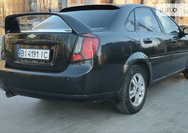 Черный Шевроле Лачетти, объемом двигателя 1.8 л и пробегом 237 тыс. км за 3850 $, фото 7 на Automoto.ua