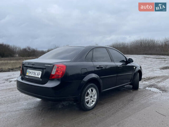 Черный Шевроле Лачетти, объемом двигателя 1.6 л и пробегом 222 тыс. км за 4400 $, фото 5 на Automoto.ua