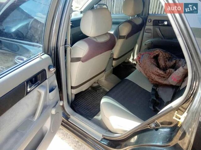 Черный Шевроле Лачетти, объемом двигателя 1.8 л и пробегом 145 тыс. км за 4100 $, фото 6 на Automoto.ua