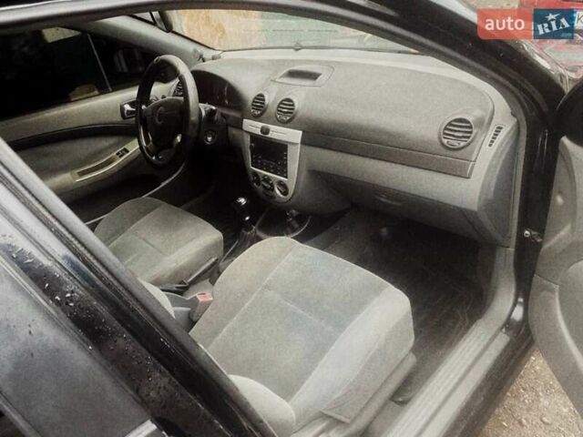 Черный Шевроле Лачетти, объемом двигателя 1.8 л и пробегом 280 тыс. км за 2750 $, фото 2 на Automoto.ua