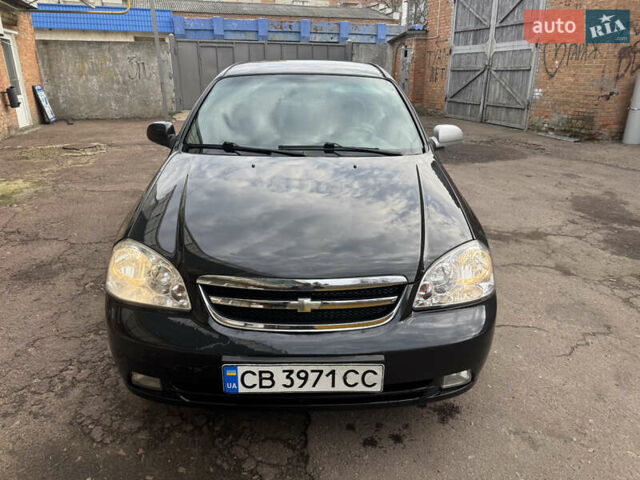 Черный Шевроле Лачетти, объемом двигателя 1.8 л и пробегом 220 тыс. км за 2999 $, фото 10 на Automoto.ua