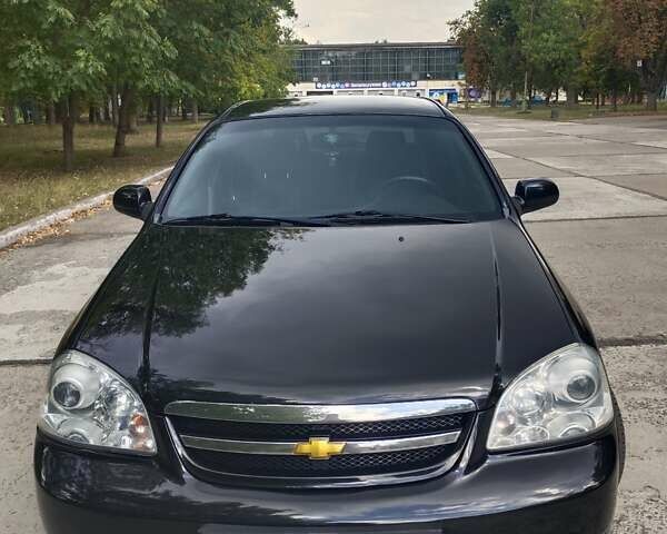 Черный Шевроле Лачетти, объемом двигателя 1.8 л и пробегом 265 тыс. км за 4600 $, фото 5 на Automoto.ua