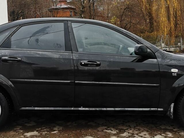 Черный Шевроле Лачетти, объемом двигателя 1.6 л и пробегом 185 тыс. км за 5300 $, фото 13 на Automoto.ua