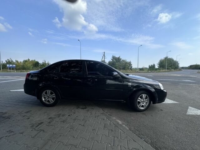 Черный Шевроле Лачетти, объемом двигателя 1.8 л и пробегом 185 тыс. км за 3700 $, фото 6 на Automoto.ua